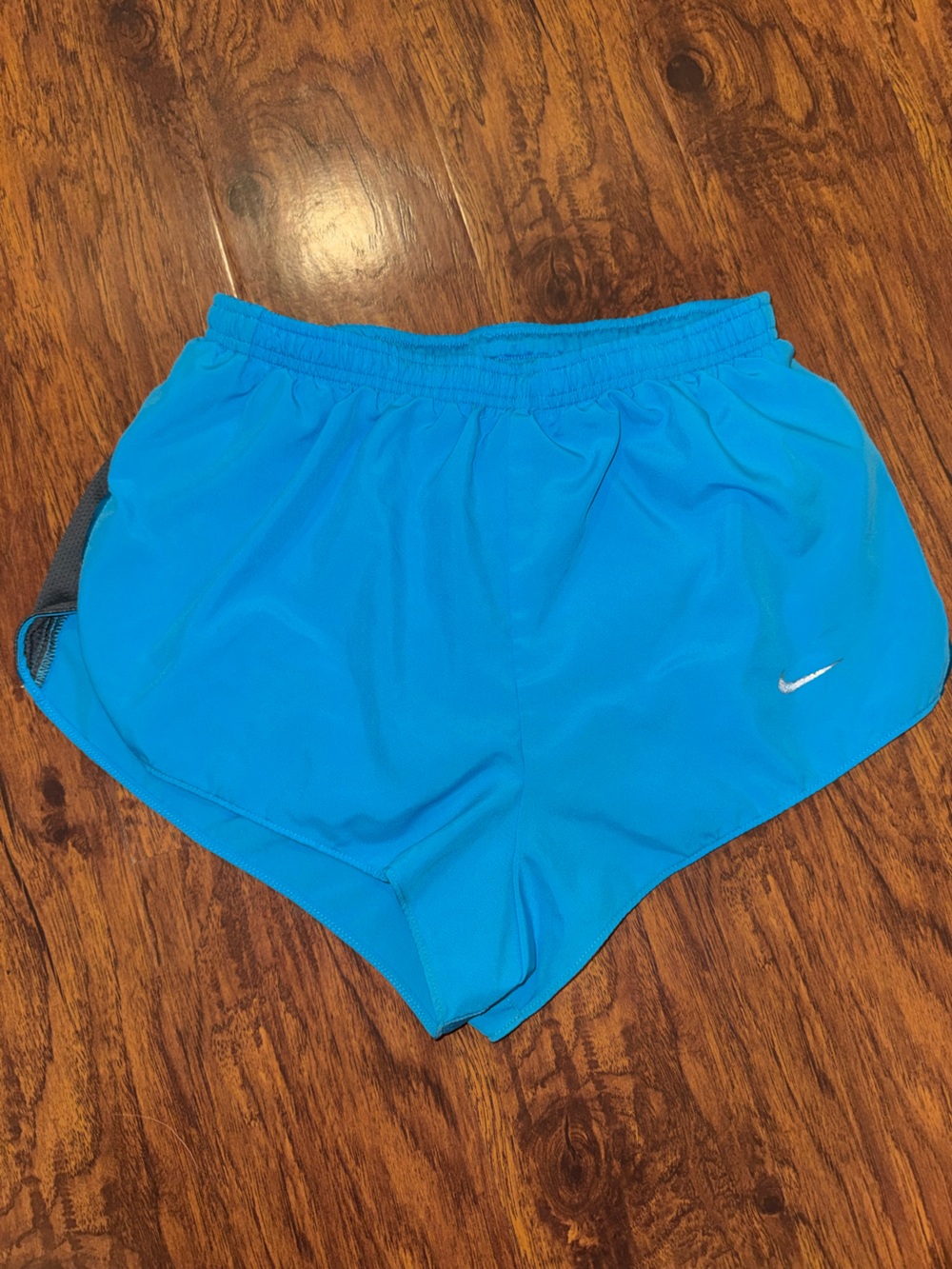 Nike Turquoise Running Shorts with Silver Swoosh